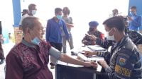 Suasana kegiatan vaksinasi yang digelar Lanal Ranai di Pelabuhan Penagi. IST